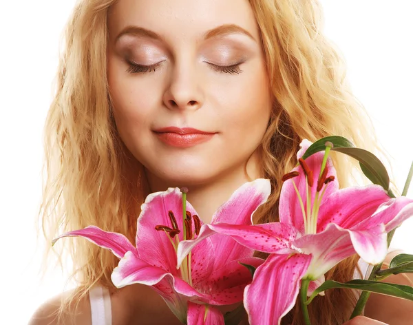 Young woman with pink lily — Stock Photo, Image