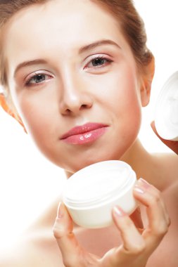 krem kavanoz tutan güzel spa kız