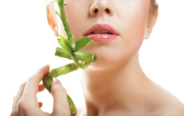 Beautiful woman with bamboo — Stock Photo, Image