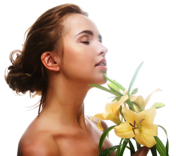 Junge schöne Frau mit Blume — Stockfoto