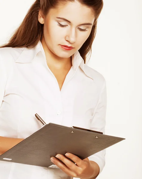 Geschäftsfrau macht sich Notizen — Stockfoto