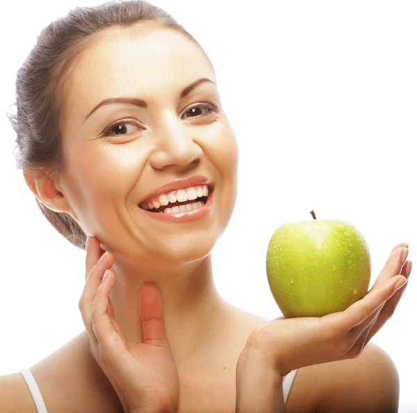 Mujer sonriente con manzana verde —  Fotos de Stock