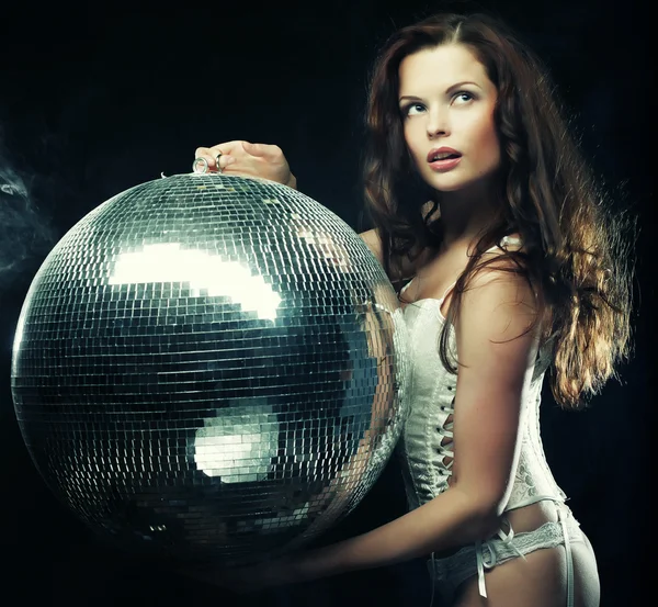 Dancer girl in smoke with disco ball — Stock Photo, Image