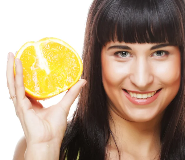 Woman with oranges in her hands Stock Image