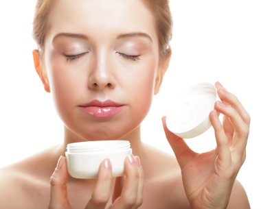 krem kavanoz tutan güzel spa kız