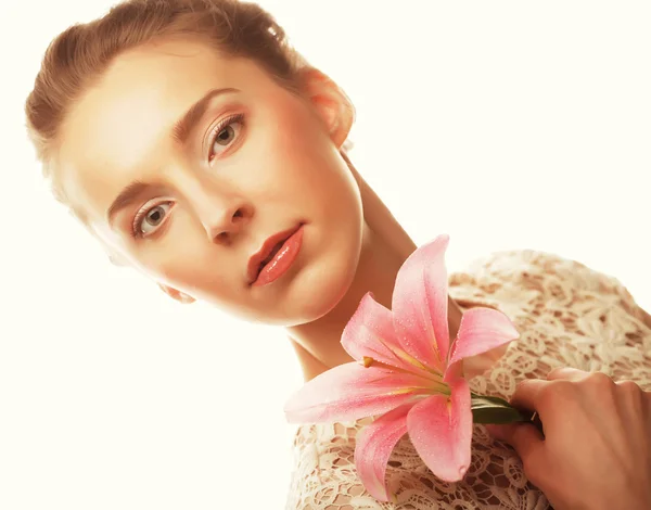 Girl holding lily flower in her hands — Stock Photo, Image