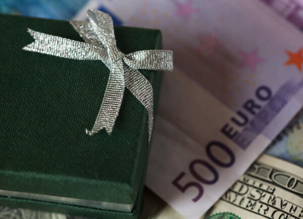 present box and money - dollar and euro