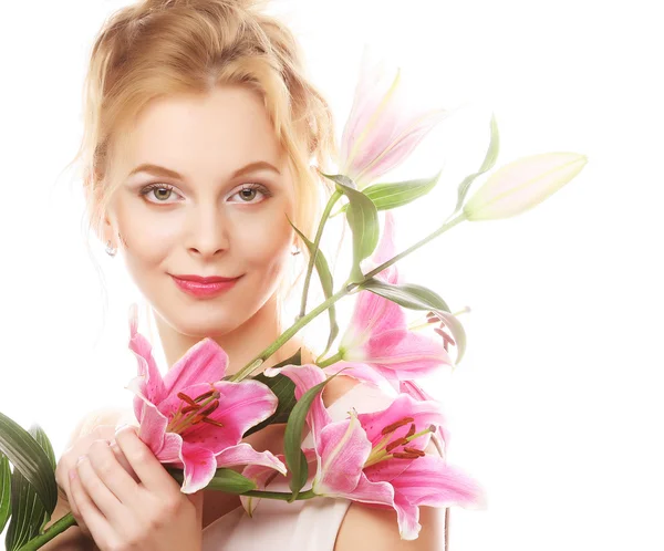 Junge Frau mit rosa Lilie — Stockfoto