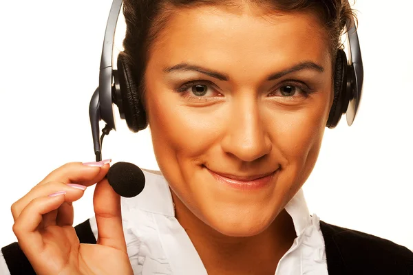 Operador sonriente del centro de llamadas con auriculares telefónicos — Foto de Stock