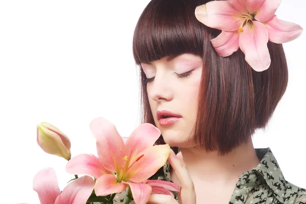 Beautiful woman with pink flower — Stock Photo, Image