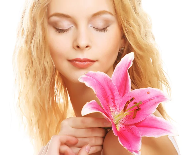 Young woman with pink lily — Stock Photo, Image