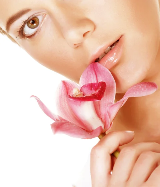 Beautiful woman with pink flower — Stock Photo, Image