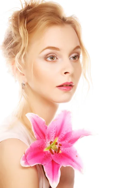 Young woman with pink lily — Stock Photo, Image