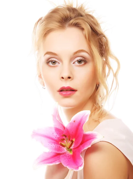 Young woman with pink lily — Stock Photo, Image