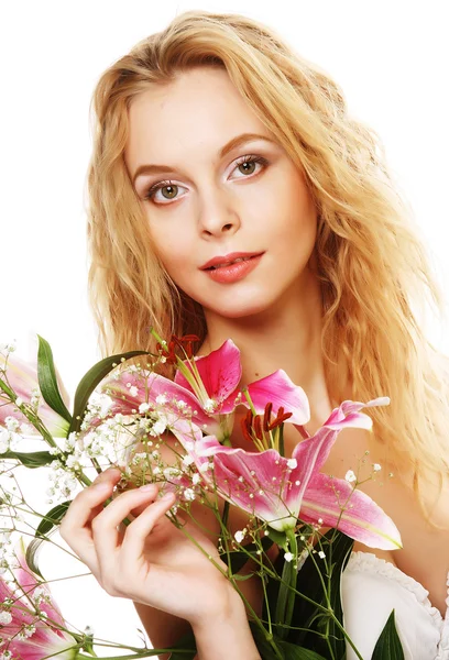 Young woman with pink lily — Stock Photo, Image