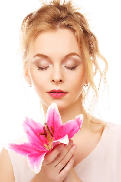 Young woman with pink lily — Stock Photo, Image