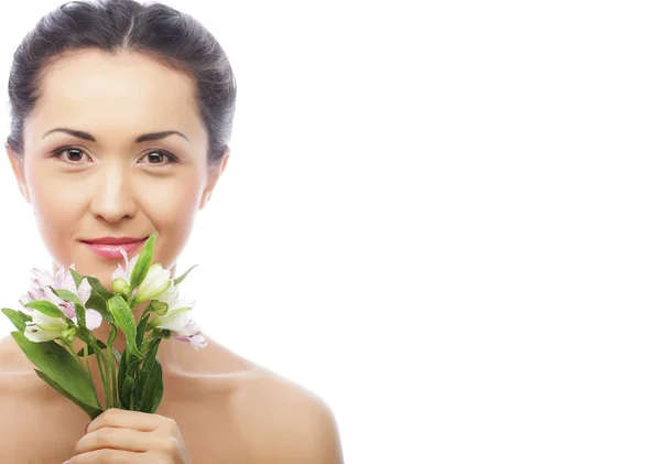 Beautiful asian woman with pink flowers — Stock Photo, Image