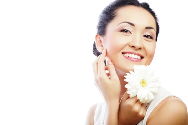 Young asian woman holding white gerber flower — Stock Photo, Image