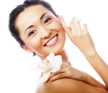 güzel bir kadın yüzü ile orkide çiçek