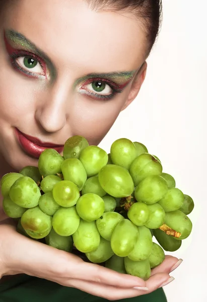 Woman with green grape — Stock Photo, Image