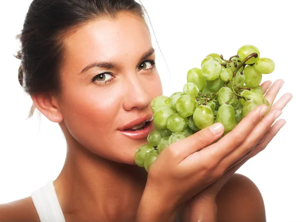 Vrouw met groene druif — Stockfoto