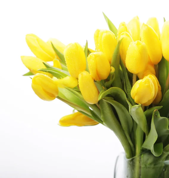 Kytice žlutých tulipánů ve váze — Stock fotografie