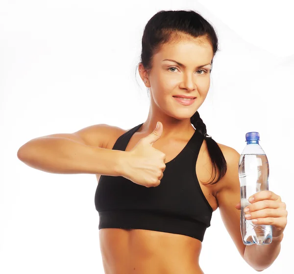 Deportiva mujer con botella de agua —  Fotos de Stock