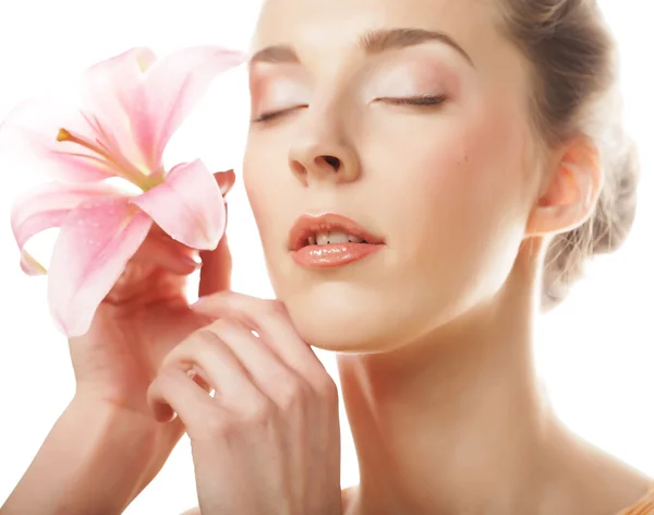 Girl holding lily flower in her hands — Stock Photo, Image