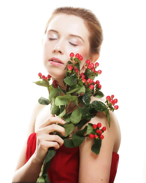 Beautiful woman with red flowers — Stock Photo, Image