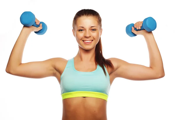 Woman in sport equipment practice with hand weights — Stock Photo, Image