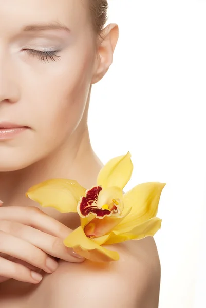 Girl holding orchid flower — Stock Photo, Image