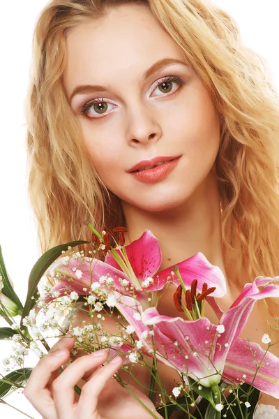 Young woman with pink lily — Stock Photo, Image