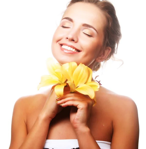 Young beautiful woman with flower Stock Image