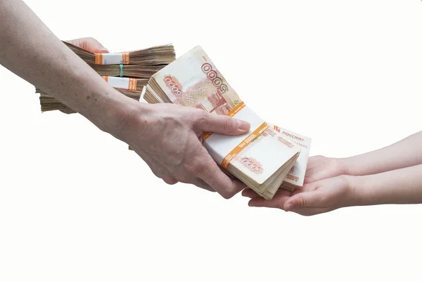 La mano de los niños y de la mujer con la pila del dinero ruso — Foto de Stock