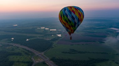 color hot air balloon in sky cloud and sunrise background at the morning time 