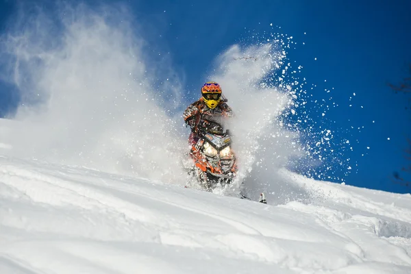 Snowmobile in winter forest in the mountains of Sakhalin Island — Stock Photo, Image