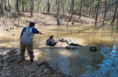 ATV drowned in a large puddle