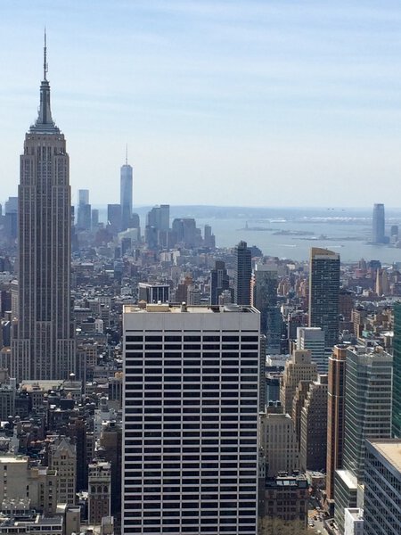 New York, USA - April 19, 2015: Manhattan view with all its famous skyscrapers and buildings, New York City. Rockefeller Center Observation Deck view. Mobile photo.
