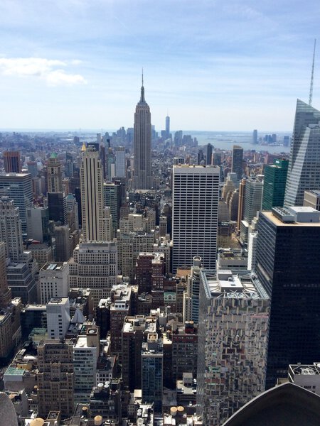 New York, USA - April 19, 2015: Manhattan view with all its famous skyscrapers and buildings, New York City. Rockefeller Center Observation Deck view. Mobile photo.