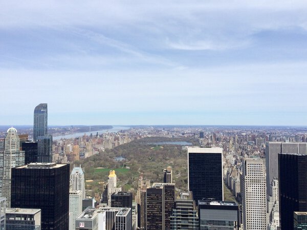 New York, USA - April 19, 2015: Central Park is one of the most famous places on Manhattan, New York City. Rockefeller Center Observation Deck view. Mobile photo.