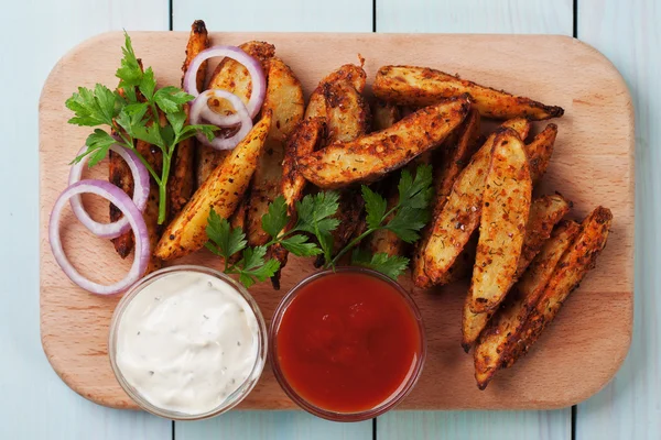 Roasted potato wedges — Stock Photo, Image