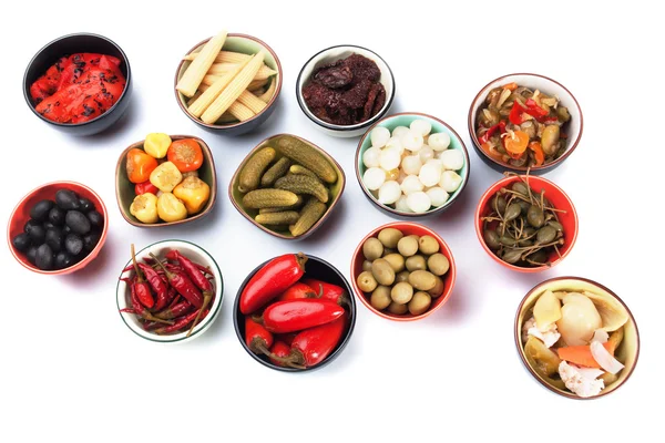 Pickled cucumber, onion, olives and vegetables — Stock Photo, Image