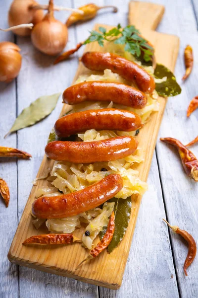 Grilled German Sausage Links Served Sauerkraut Sour Cabbage — Stock Photo, Image