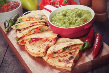 Quesadillas with guacamole clipart