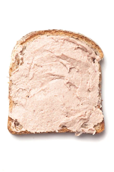 Pastetaufstrich auf Scheibe Brot — Stockfoto