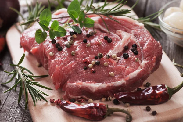 Raw rib-eye steak — Stock Photo, Image