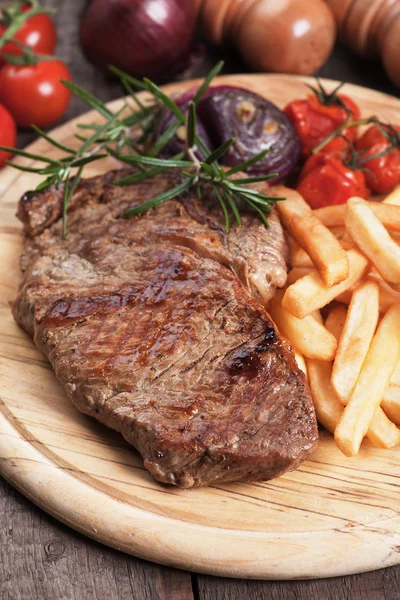 Beef steak with french fries — Stock Photo, Image