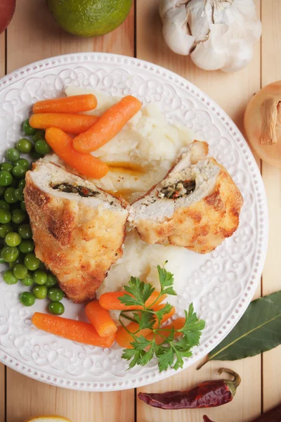 Chicken Kiev with vegetables — Stock Photo, Image