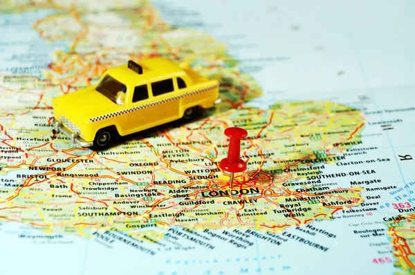 London, UK map pin taxi — стоковое фото