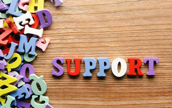 Support   letters      wood — Stock Photo, Image